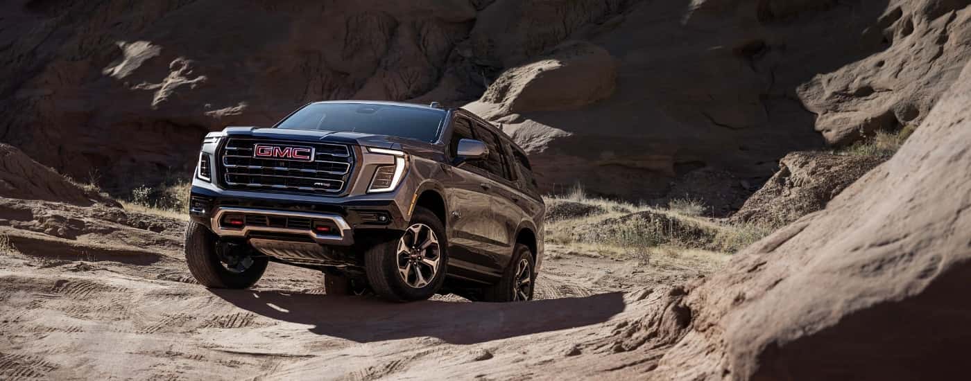 A grey 2025 GMC Yukon from the front after leaving a GMC dealer in Columbia.