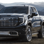 Blue 2026 GMC Sierra 1500 Denali parked to find a GMC dealer near Lexington
