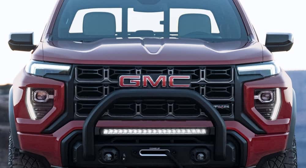 Grille on a red 2026 GMC Canyon AT4X