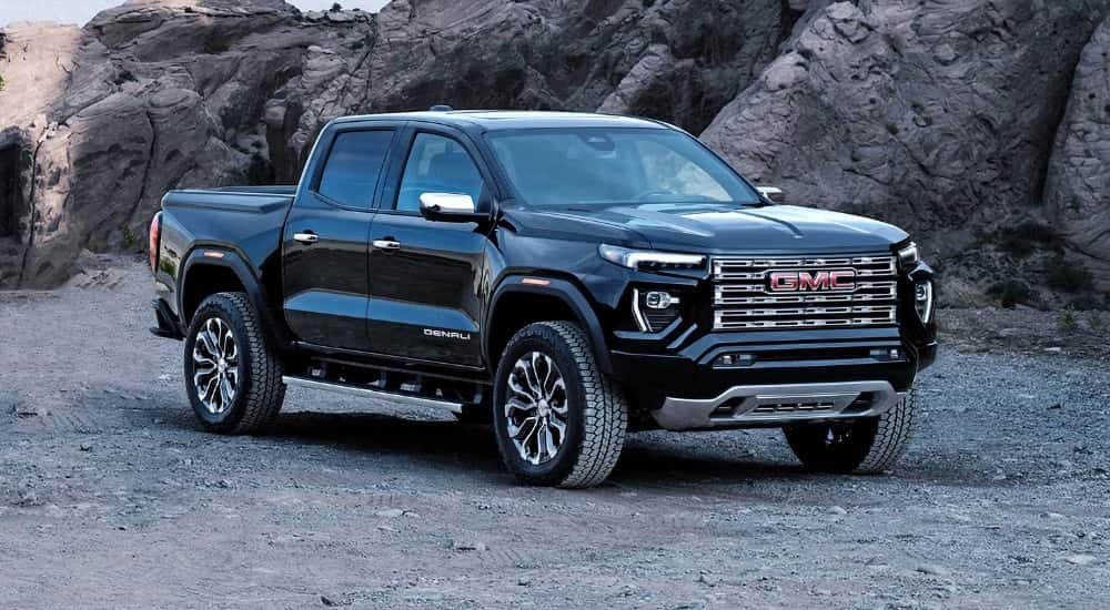 Black 2026 GMC Canyon Denali parked off-road