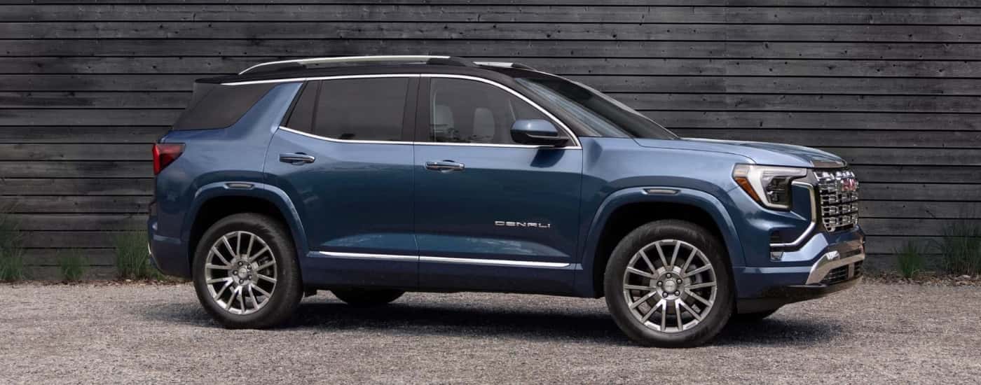 Blue 2026 GMC Terrain Denali parked at an angle
