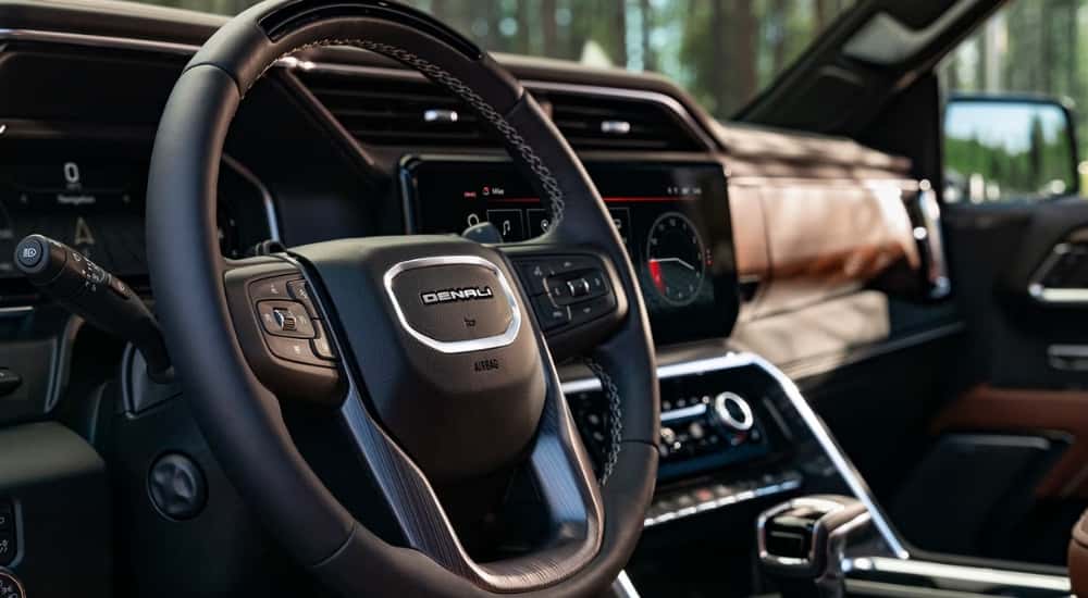 Black and brown interior in a 2026 GMC Sierra 1500 Denali 