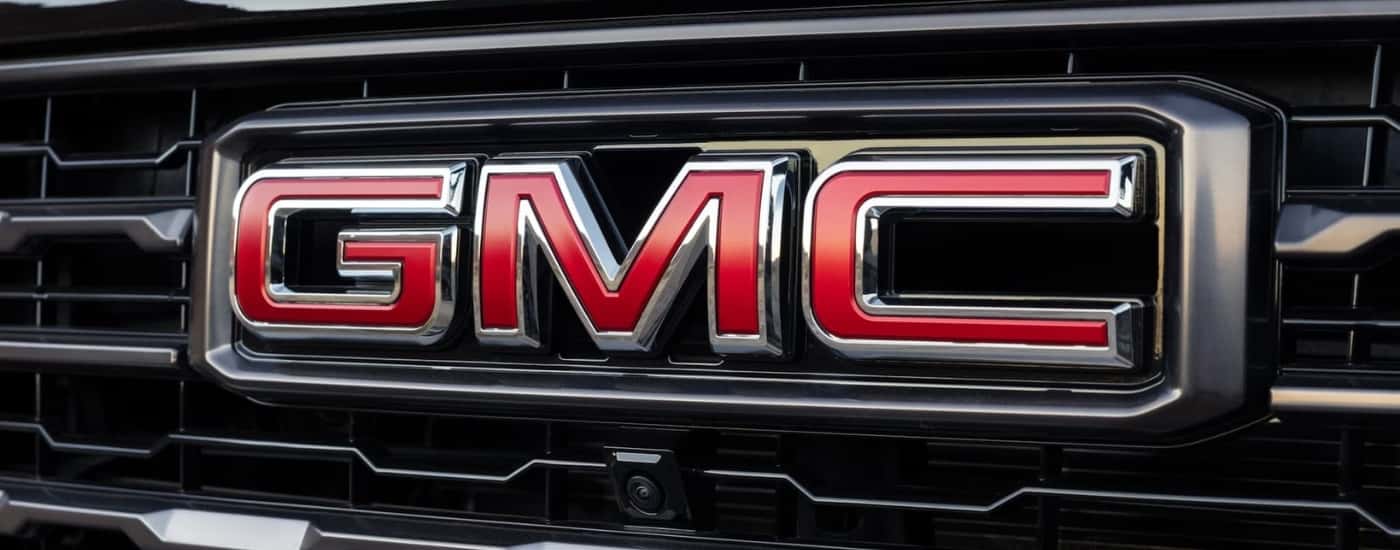 Badge on front grille of a 2025 GMC Yukon.