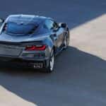 A grey 2026 Chevy Corvette E-Ray from behind.