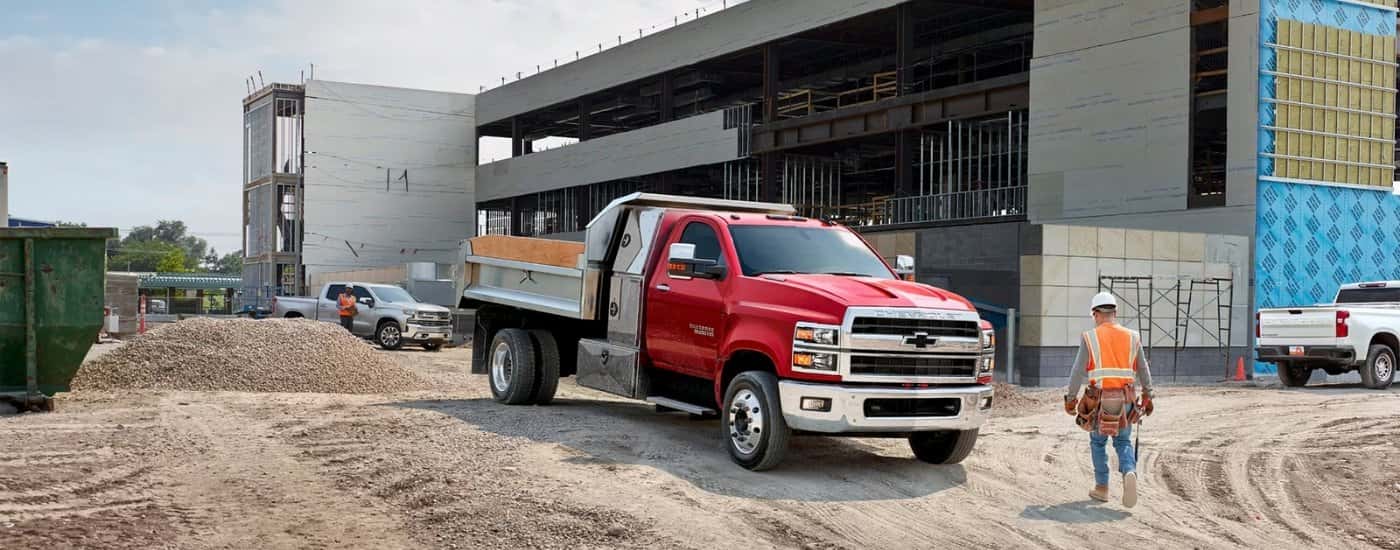 A red 2025 Chevy Silverado 6500 from the front at an angle.