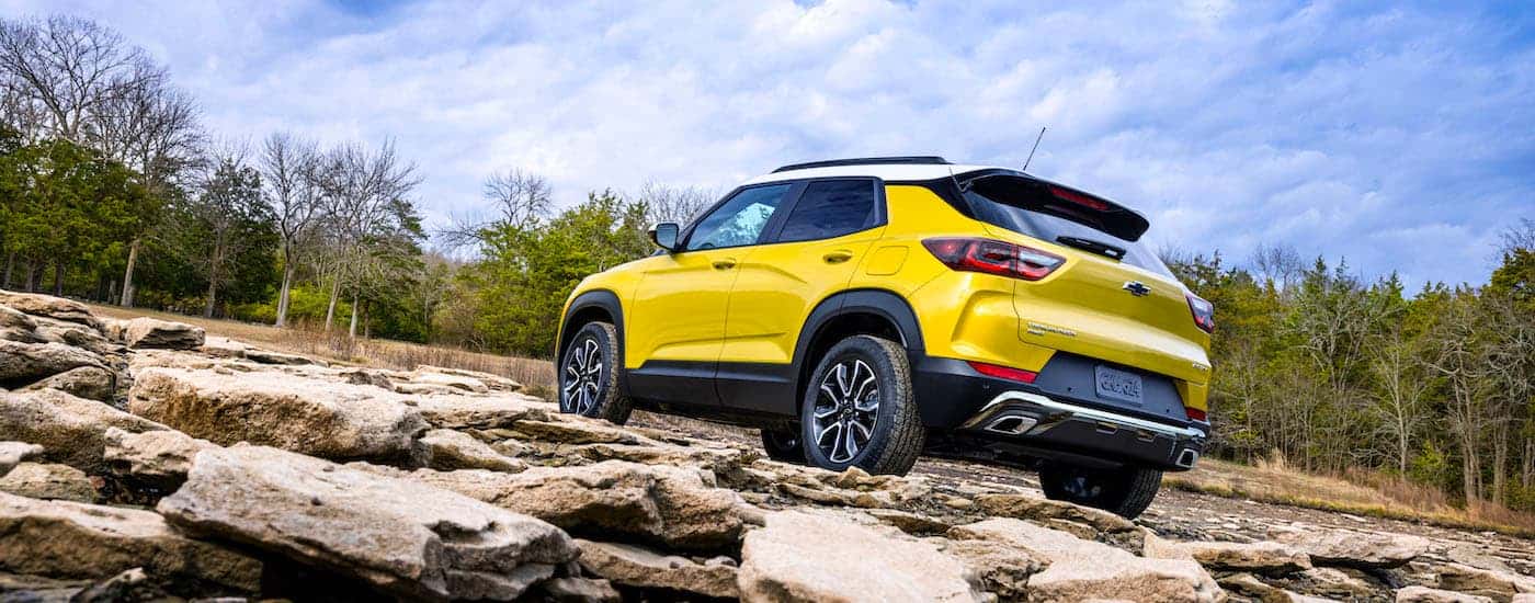 A yellow 2025 Chevy Trailblazer from the rear after leaving a Chevy dealer near Lexington.