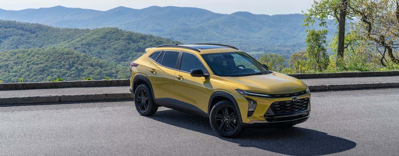 A yellow 2025 Chevy Trax from the front at an angle.