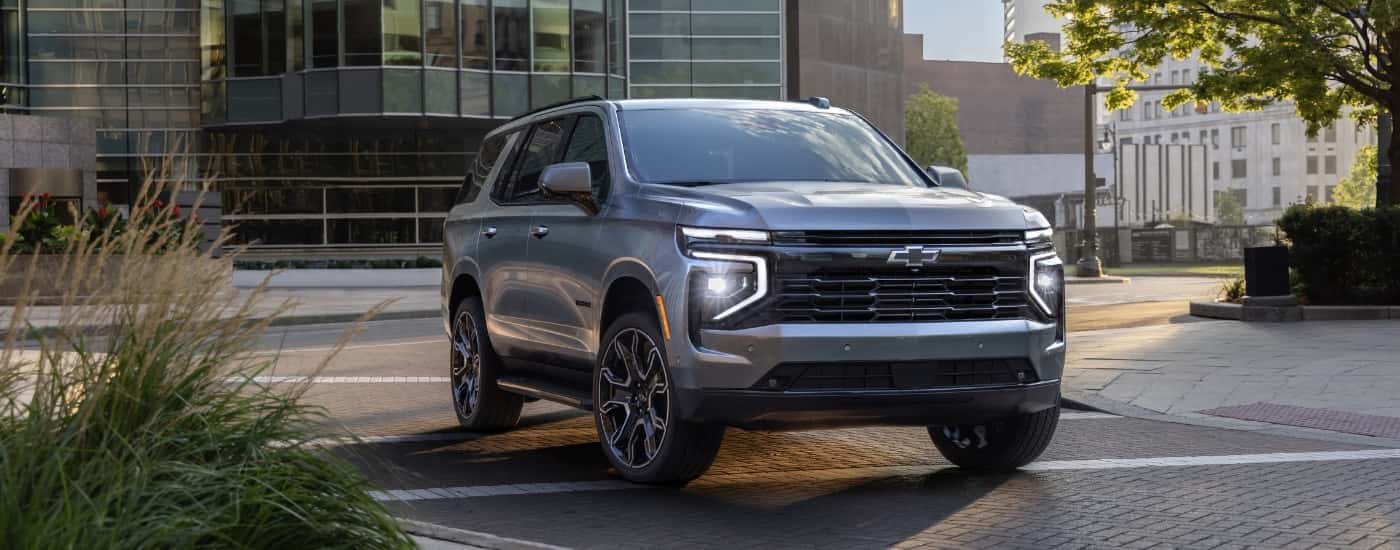 A grey 2025 Chevy Tahoe from the front at an angle.