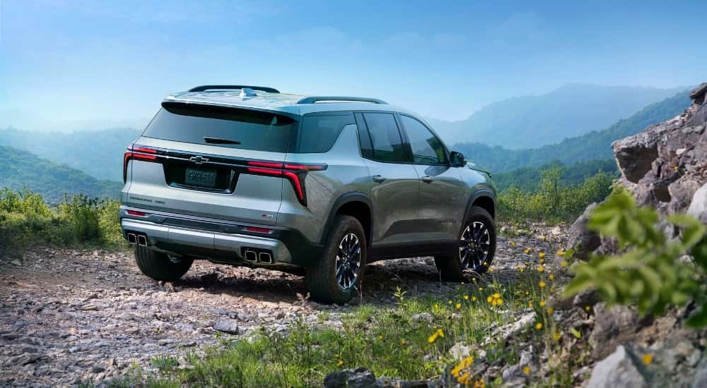 Grey 2026 Chevy Traverse Z71 driving on a trail
