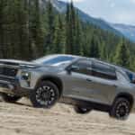 Grey 2026 Chevy Traverse Z71 for sale driving off-road