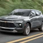 Grey 2026 Chevy Blazer for sale driving on a highway