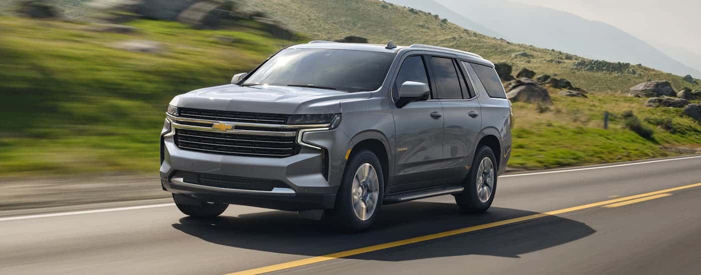 Grey 2021 Chevy Tahoe on a rural street