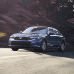 A Honda Civic driving on the highway