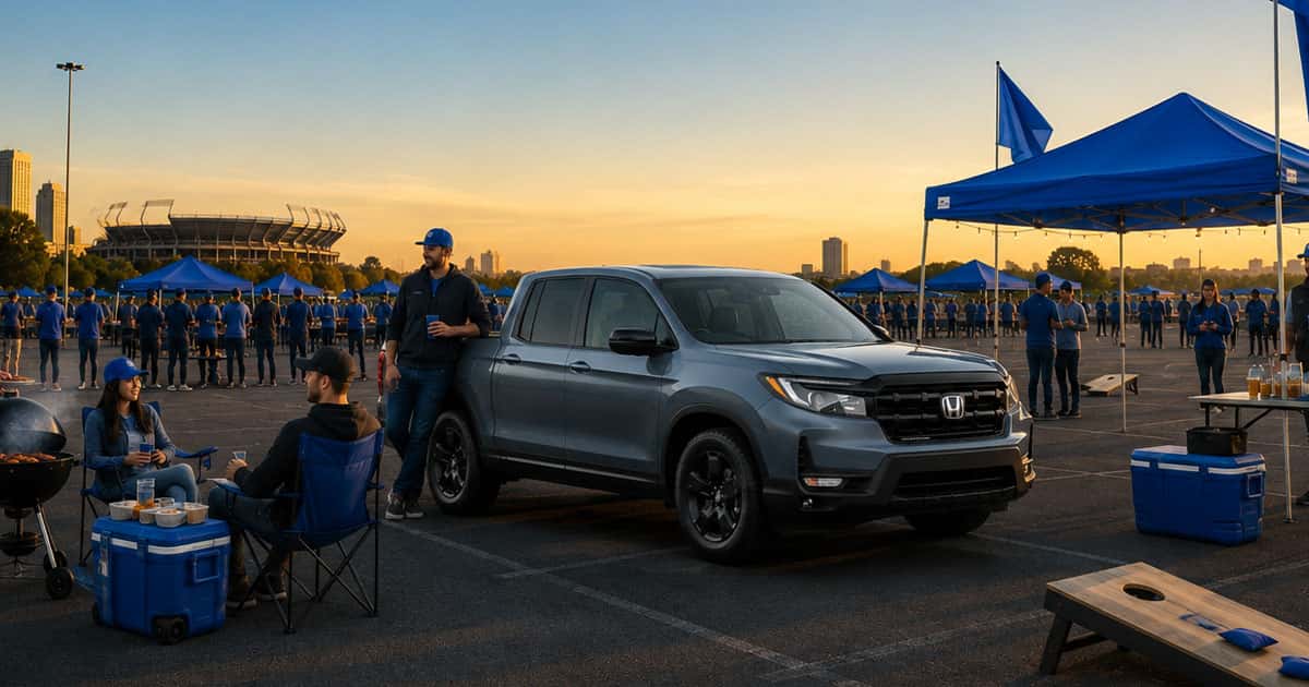 The Honda Ridgeline, featuring a crew cab layout and a tailgate party setup in a parking lot.