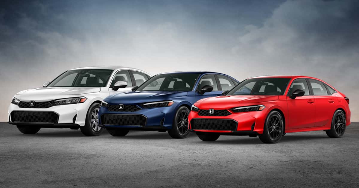 A group of new Honda Civic vehicles available in both sedan and hatchback body styles