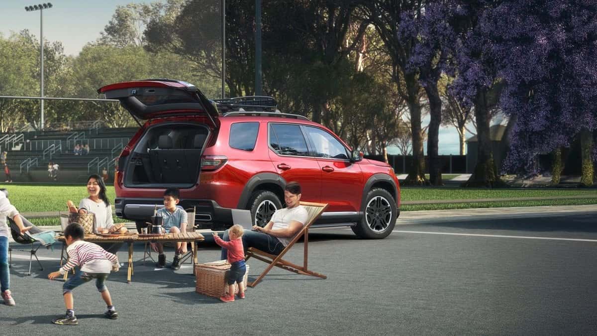 2026 Honda Pilot in Radiant Red Metallic with the tailgate open