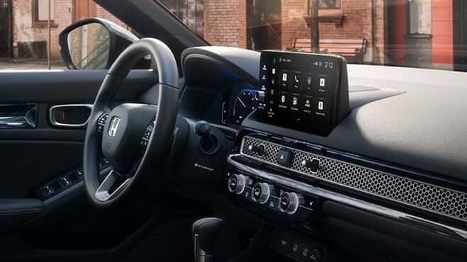 2026 Honda Civic Sport Touring Hybrid dashboard with center touchscreen