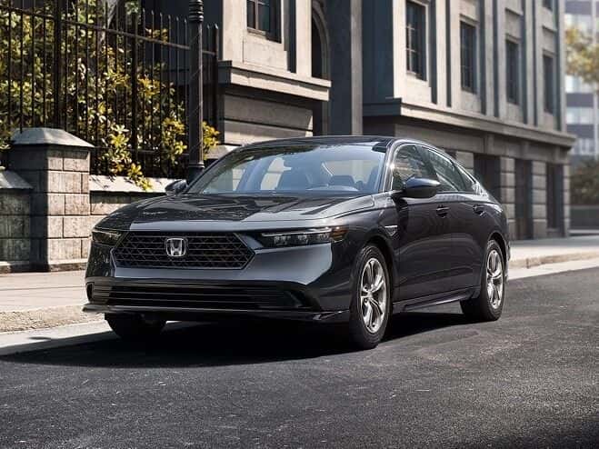 2026 Honda Accord parked on a city street, priced from $28,395
