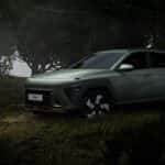 Green SUV in Dense Forest Setting