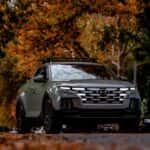 Modern Pickup Truck on Autumn Leafy Street