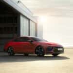 The HYUNDAI SONATA in front of a warehouse