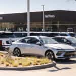 A silver Hyundai Sonata parked at Huffines Hyundai McKinney