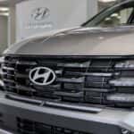 The grill of a silver Hyundai Tucson