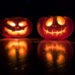 two glowing jack-o-lanterns