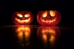 two glowing jack-o-lanterns