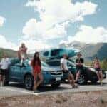 2024 subaru forester with people around them