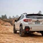 Back of a White Subaru on a Desert