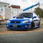 Blue Subaru WRX STI in Industrial Setting