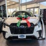 A white Subaru Ascent in the Huffines Subaru Corinth showroom