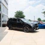 An black Subaru Ascent parked in front of Huffines Subaru Corinth