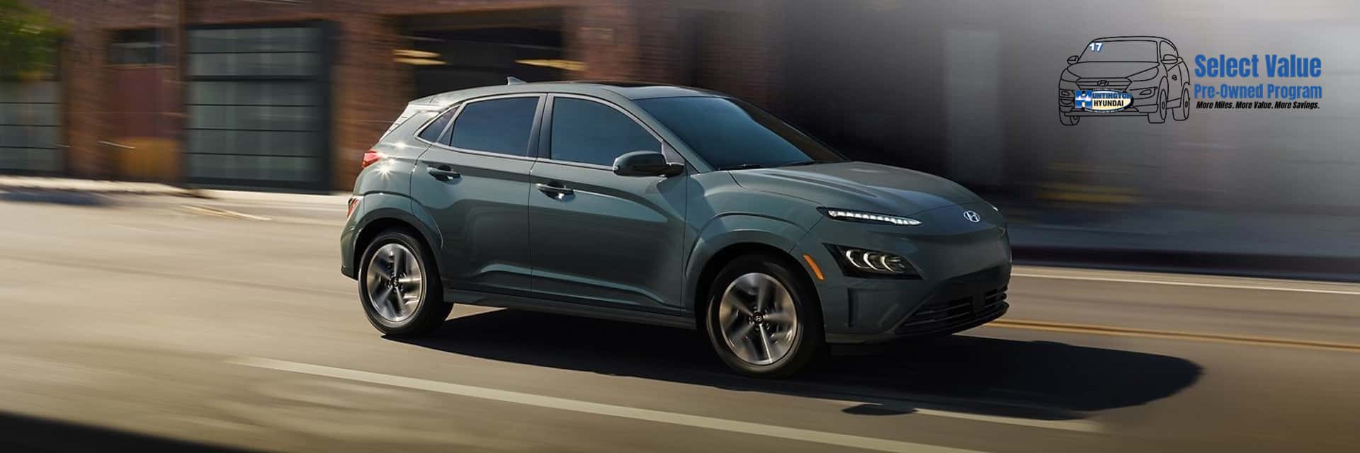 2025 hyundai kona ev driving on city street