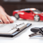 Contract getting signed at a car dealership