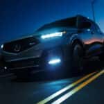 Acura MDX driving at night