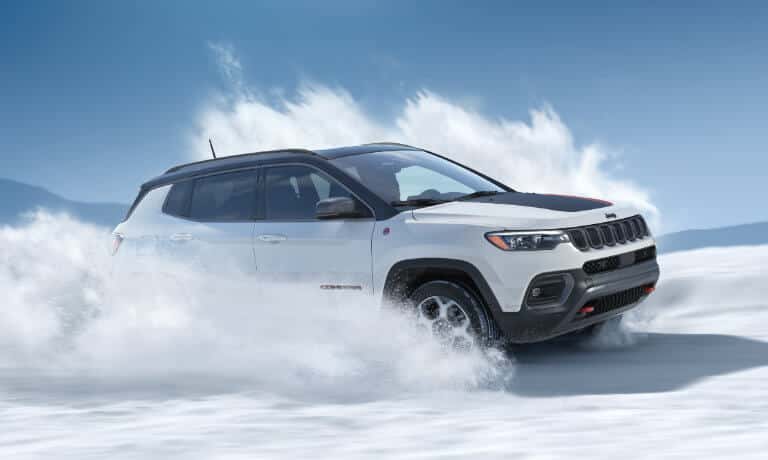 2026 Jeep Compass driving in the snow
