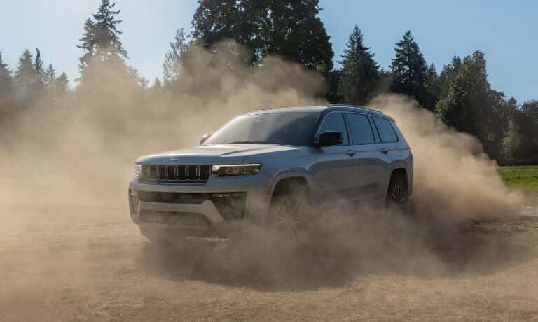 2026 Jeep Grand Cherokee kicking up dust