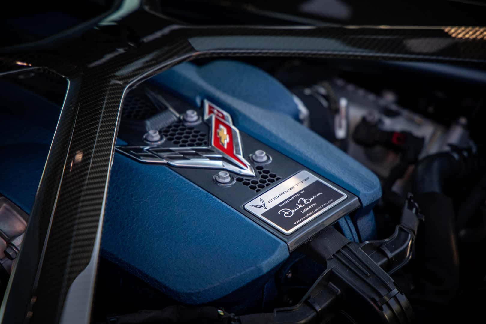 2027 Corvette ZR1X LT7 twin-turbo V8 engine bay with the builder's signature