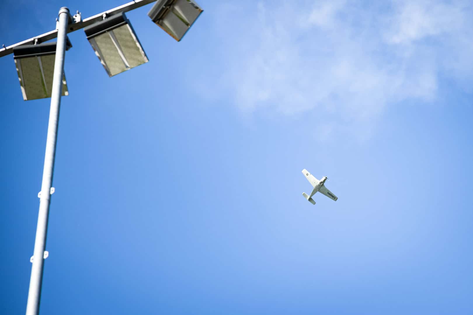 WWII warbird flyover above Belzer Stadium during the National Anthem