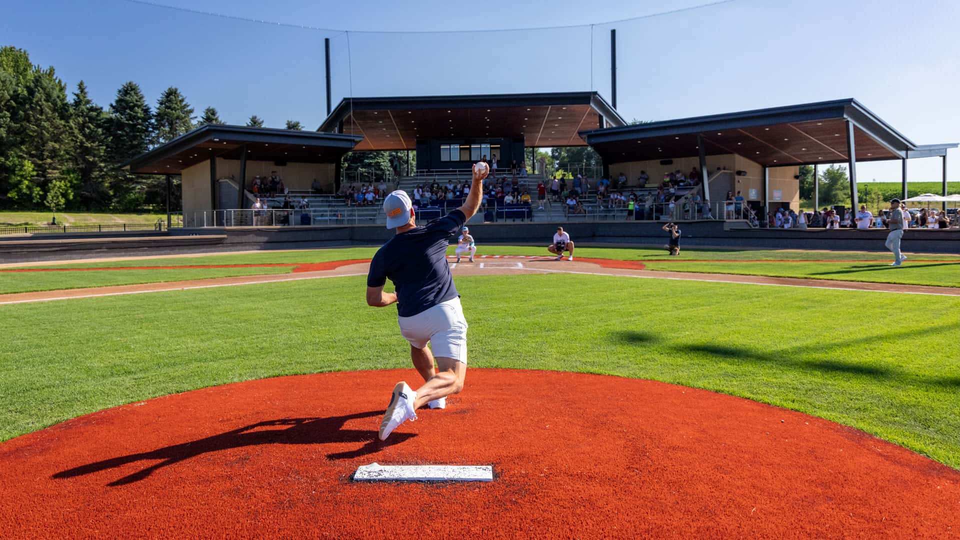 Jeff Belzer throws the ceremonial first pitch at Belzer Stadium