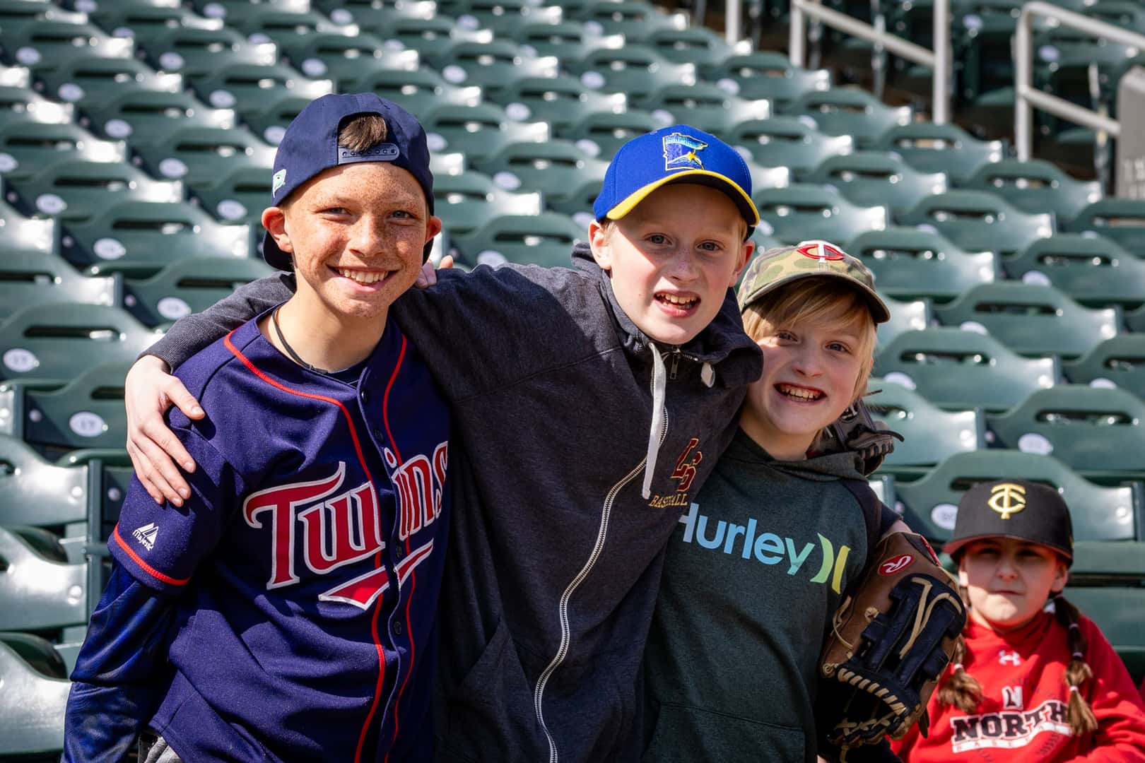 Group of Lakeville youth baseball players in the stands at Target Field