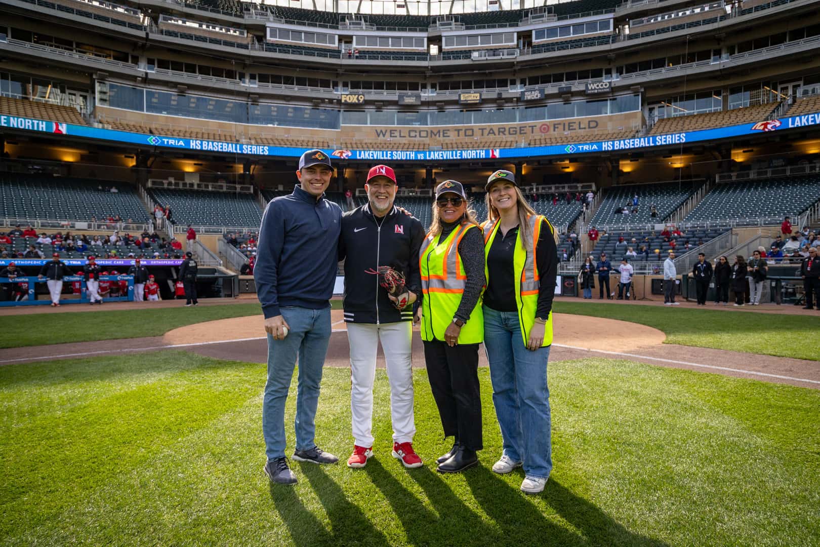 Ceremonial first pitch from Safety Signs before the Lakeville North vs. Lakeville South game at Target Field