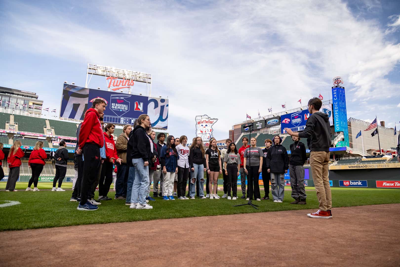 Lakeville high school choir sings the national anthem at Target Field