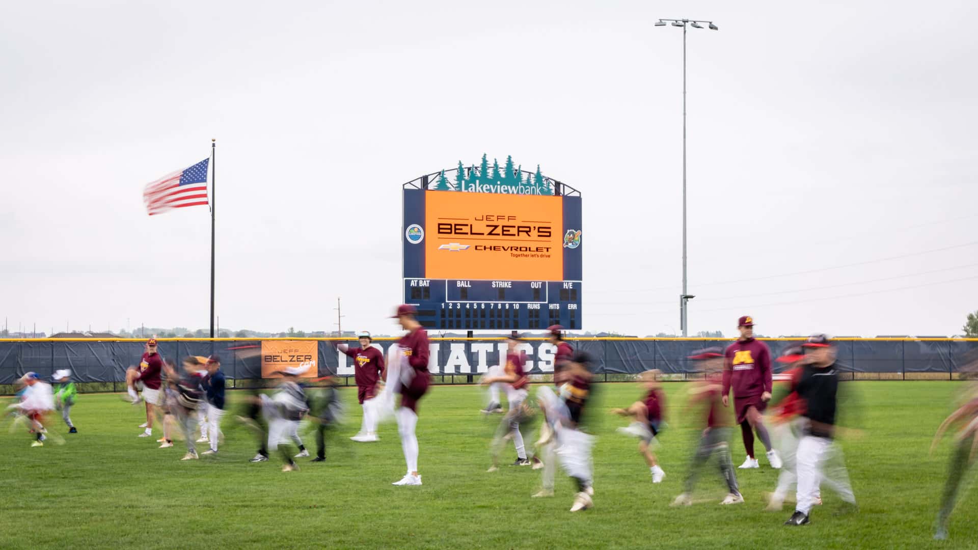 Young baseball players warming up during the 2026 Gopher Baseball Youth Clinic at Belzer Stadium in Lakeville