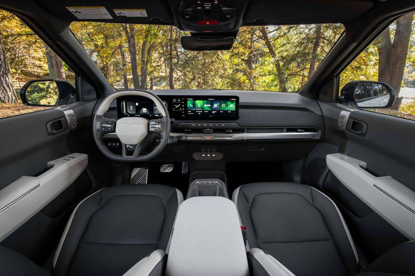 2027 Kia EV3 front row interior with modern display layout