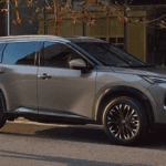 Nissan Rogue Parked outside building