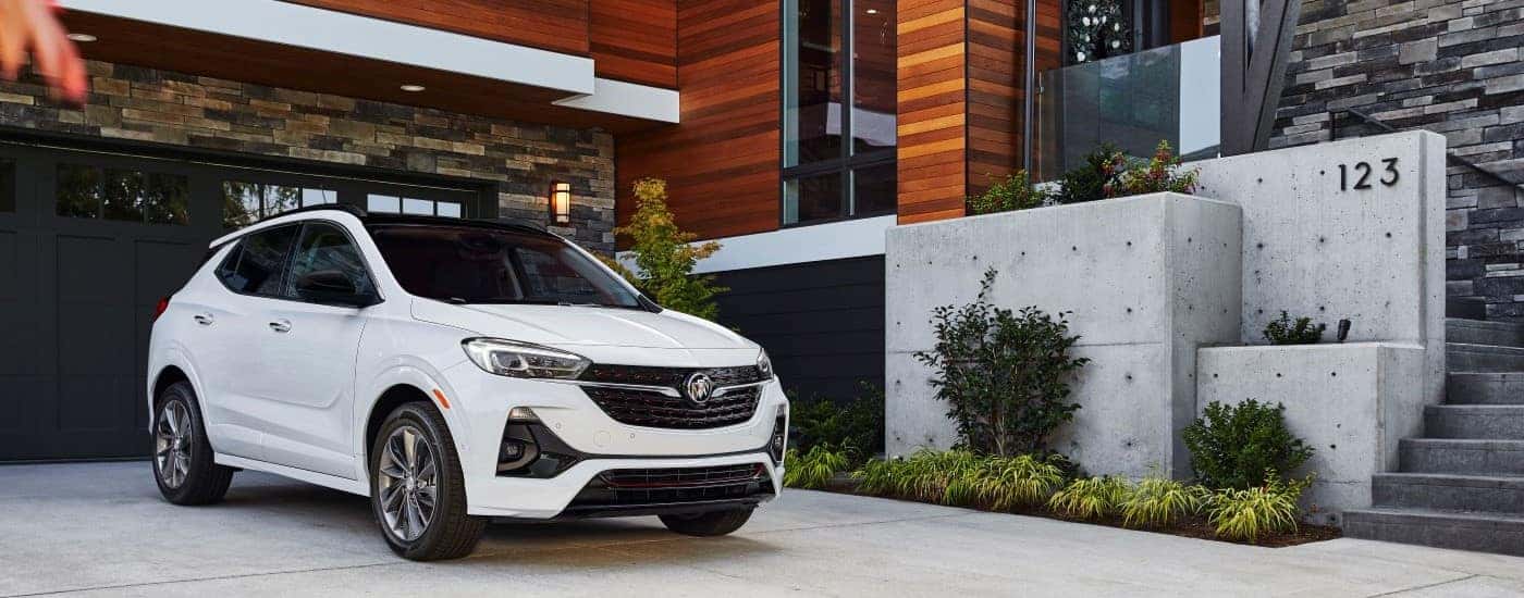 A white 020 Buick Encore GX ST is shown parked on a driveway.