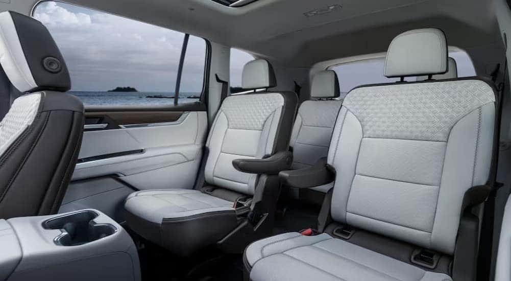 The black and white interior of a 2024 GMC Acadia is shown.